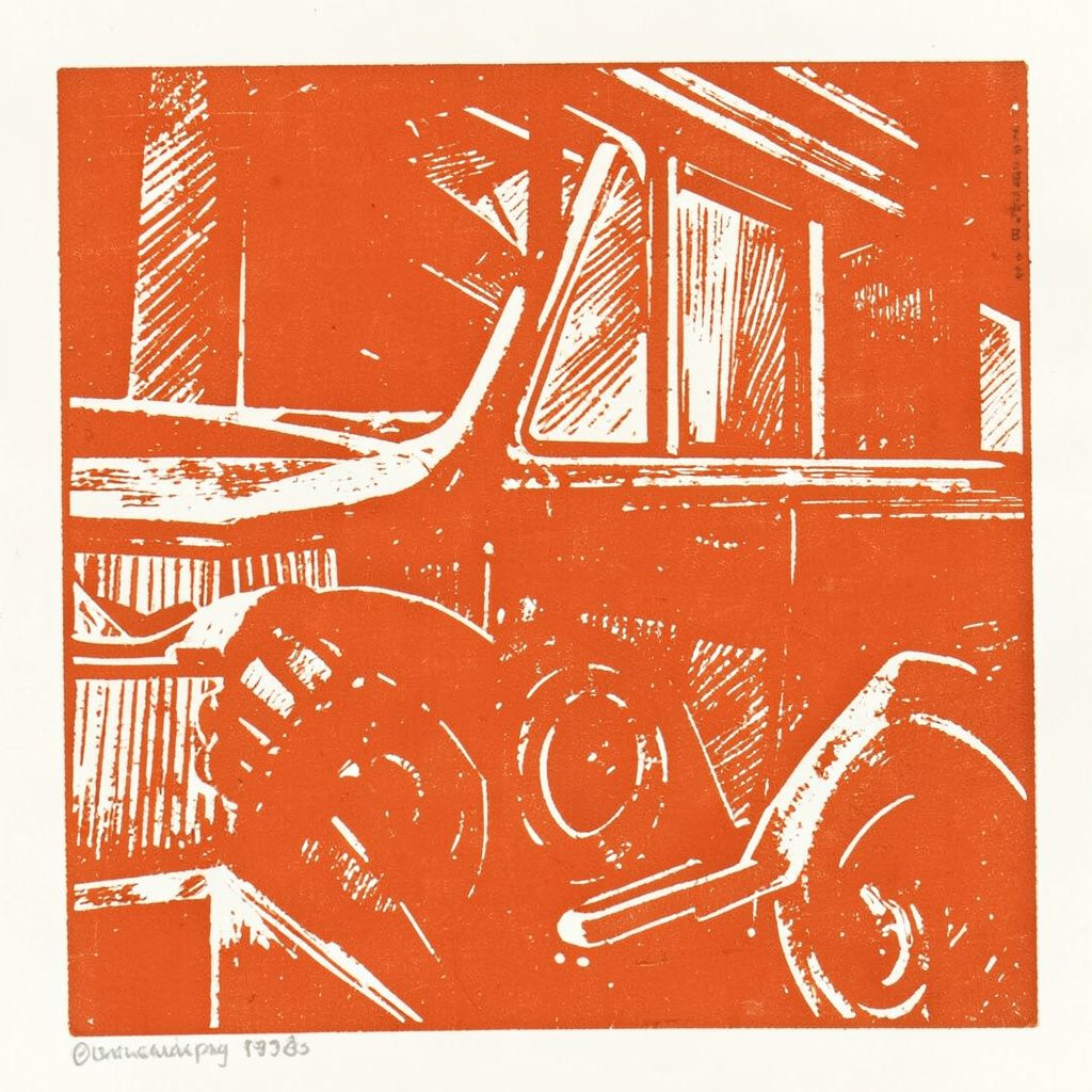 Carved linocut relief print of an envelope in olive-gold and navy tones