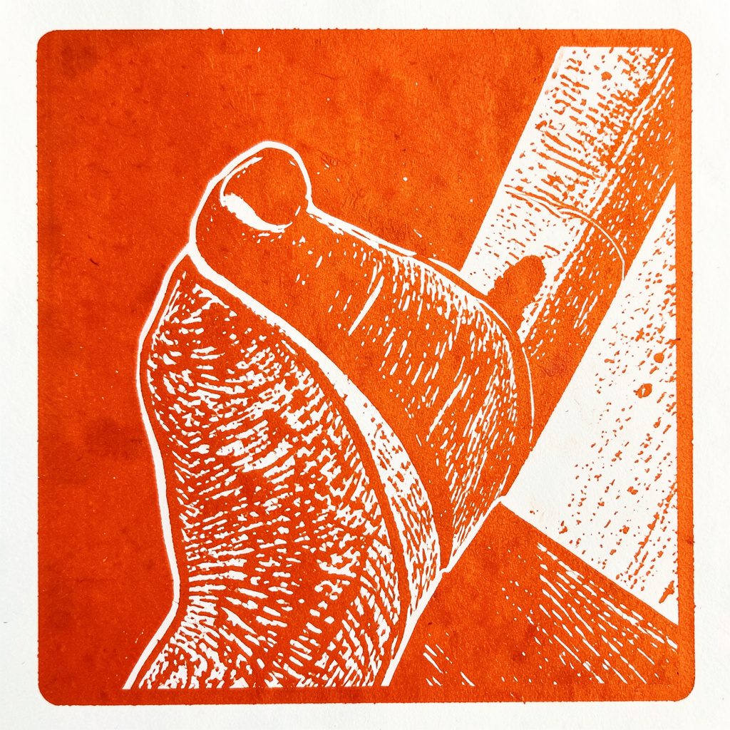 Carved linocut relief print of logistics containers in navy